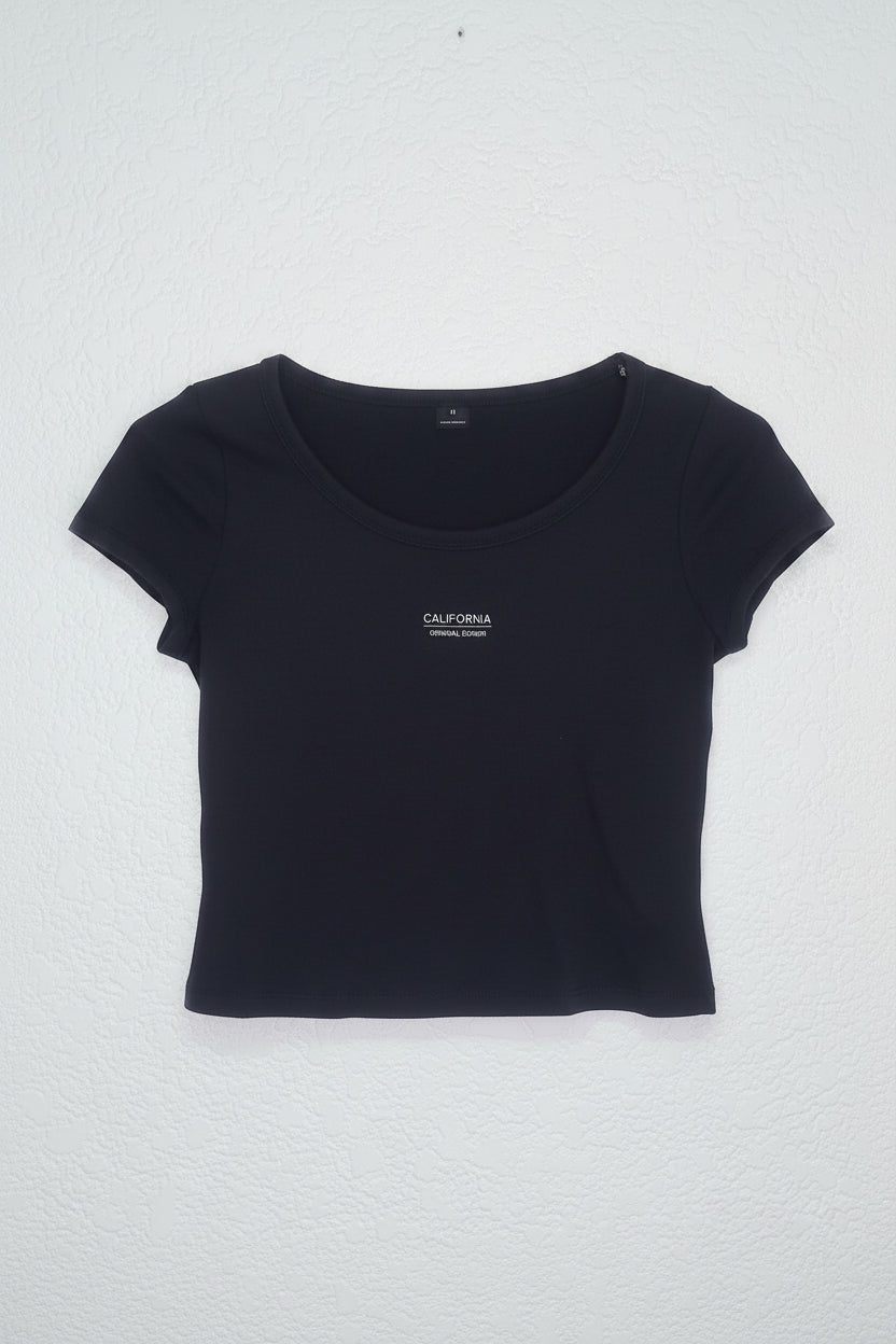 Camiseta para dama, cuello redondo, color negro. Talla M