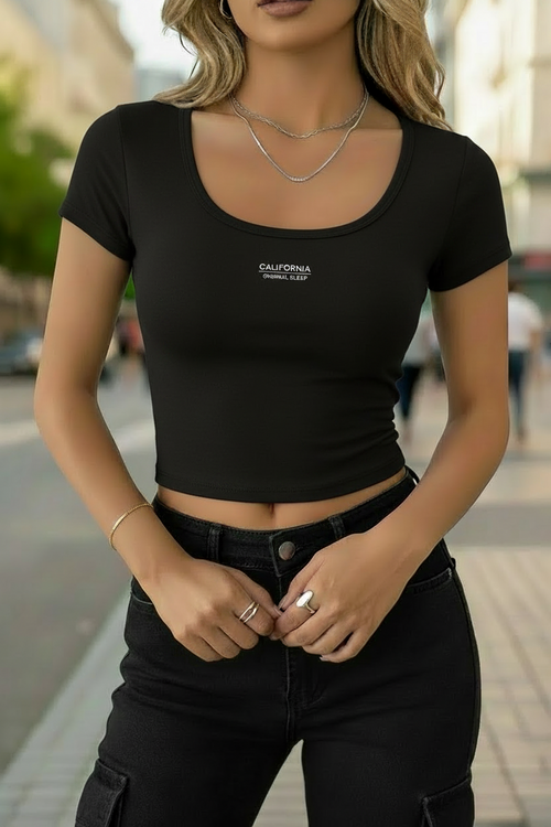 Camiseta para dama, cuello redondo, color negro. Talla M