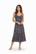 Vestido con estampado floral de margarita, talla M.